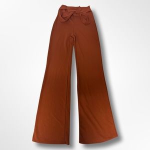 Burnt orange high-rise flare tie front pants